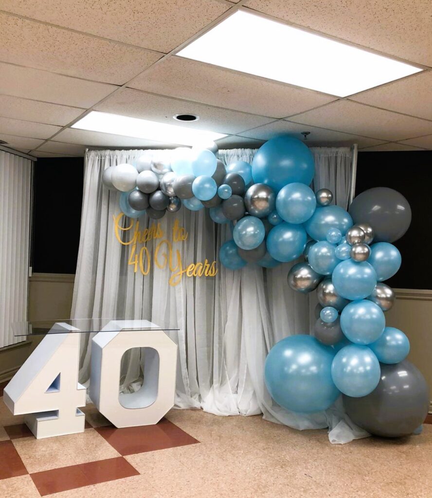 Multi-Coloured Balloon Decor with White Marquee Letters Table Georgetown