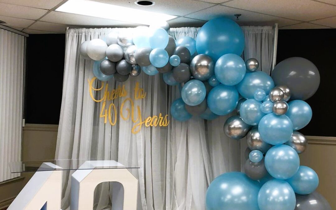 Multi-Coloured Balloon Decor with White Marquee Letters Table Georgetown - Georgetown Balloon Décor Service